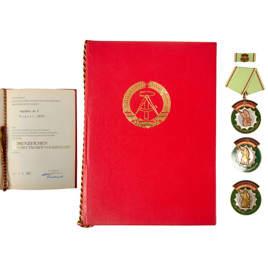Original Cold War East German DDR Ehrenzeichen der Deutschen Volkspolizei Medal Group with 1987 Kriminalpolizei Award Document - Types II, III & IV