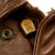 Original U.S. WWII B-17 Mission Belle Distinguished Flying Cross Navigator Harry Larson’s Painted A2 Flight Jacket, Uniform, and Pilot’s Navigation Kit with Packet of Research - 885th Bomb Squadron, 2641st Special Operations Group Original Items