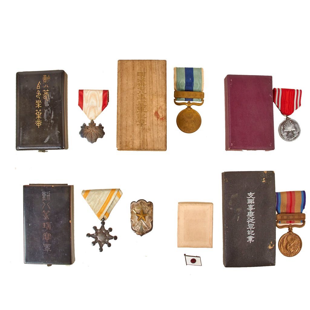 Original Japanese WWII Lot of Six Medals in Original Boxes - Russo-Japanese War Medal, 1937-45 China Incident War Medal, Order of the Sacred Treasure, Order of the Rising Sun, Red Cross Medal, and Time Expired Soldiers League Badge Original Items