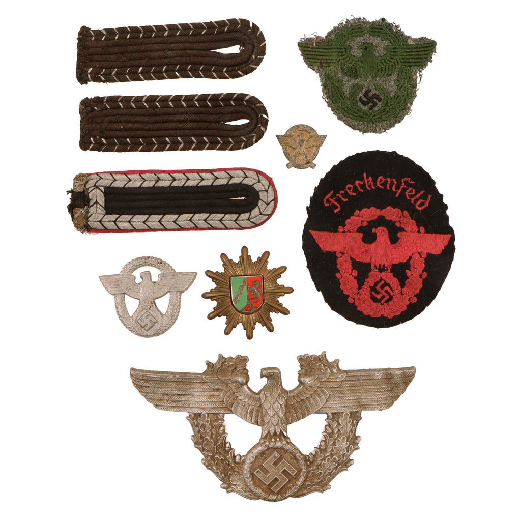 Original German WWII Police Metal and Cloth Insignia Grouping with Two Police Arm Patches and More - 9 Items Original Items