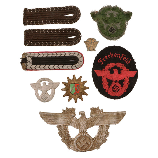 Original German WWII Police Metal and Cloth Insignia Grouping with Two Police Arm Patches and More - 9 Items