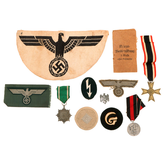 Original German WWII Award and Insignia Grouping with War Merit Cross KvK, Austrian Anschluss Medal, and More - 10 Items Original Items