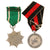 Original German WWII Award and Insignia Grouping with War Merit Cross KvK, Austrian Anschluss Medal, and More - 10 Items Original Items