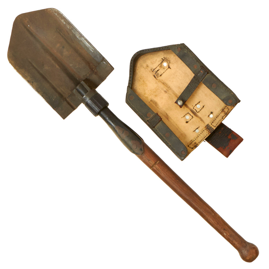 Original German WWII Folding Shovel Klappspaten with Rare 1941 Dated  Max G. Müller of Nürnberg O., in Bavaria,&nbsp;who was known&nbsp;leathermaker of the time that produced holsters, saddles and other leather goods. Carrier by Max G. Müller Original Items