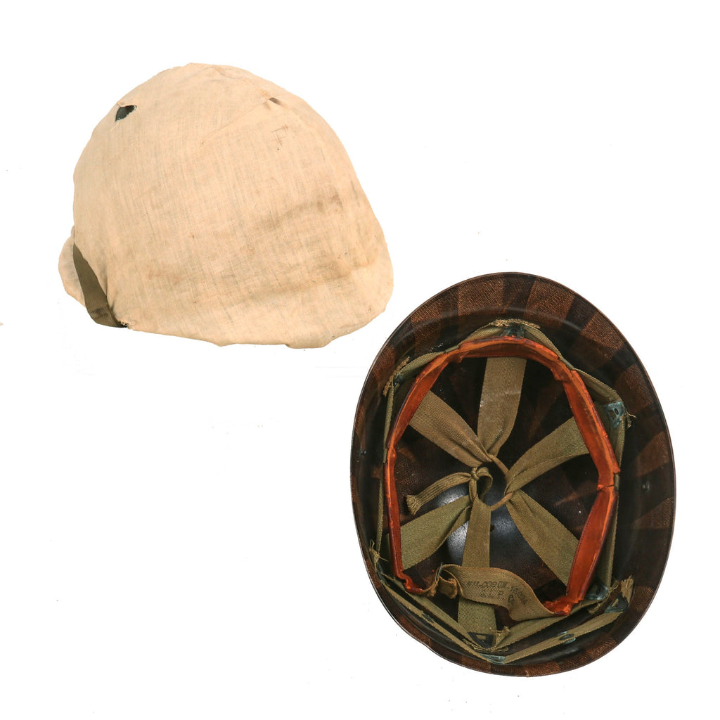 Original U.S. WWII Early 1942 M1 McCord Front Seam Fixed Bale Helmet with Field Made Snow Camouflage Cover and Westinghouse Liner Original Items