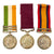 Original British Second Boer War West Yorkshire Regiment Named Version Two Queen's South Africa Medal, King's South Africa Medal, and Long Service Good Conduct Medal - Color Sergeant John Arthur Smith Original Items