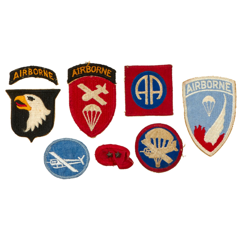 Original U.S. WWII Airborne Patch & Insignia Lot - 101st & 82nd Divisions, Oval with Campaign Stars & Paraglider Garrison Cap Patches - 7 Pieces Total Original Items