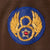 Original U.S. WWII 8th Air Force Captain Officer’s British-Made Ike Jacket with Bullion Pilot Wings on Blue “Combat Crew” Field & English-Made Bullion SSI Original Items