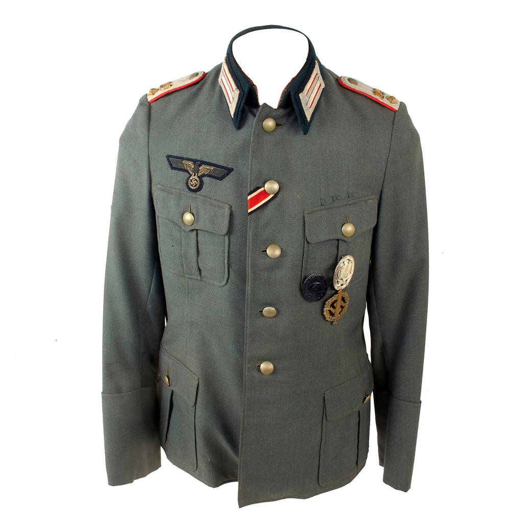 Original German WWII Heer 19th Artillery Regiment Oberleutnant’s M36 Uniform Tunic with Bullion Breast Eagle and Awards Original Items