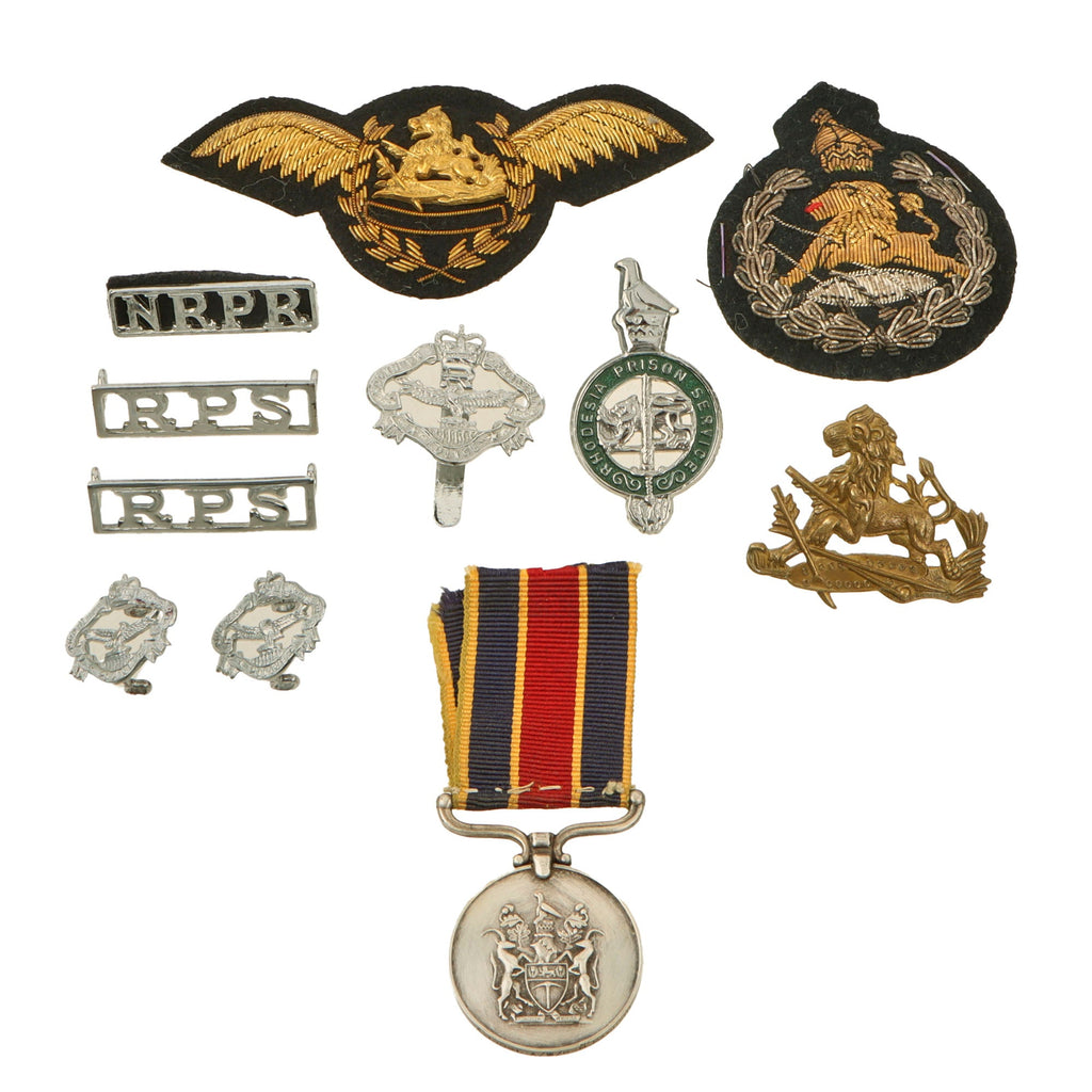 Original Rhodesian Bush War to Modern Era Military Insignia Lot with Medal, Belt Pins, & Patches Original Items