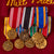Original U.S. WWII 29th Infantry Division & AAF Stalag Luft IV POW Veteran Grouping with MIA Western Union Telegram, Veterans’ Vest with Mini-Medal Bar and Pins, and a Lot of Veterans Association Ephemera - Sergeant Milton O. Price Original Items