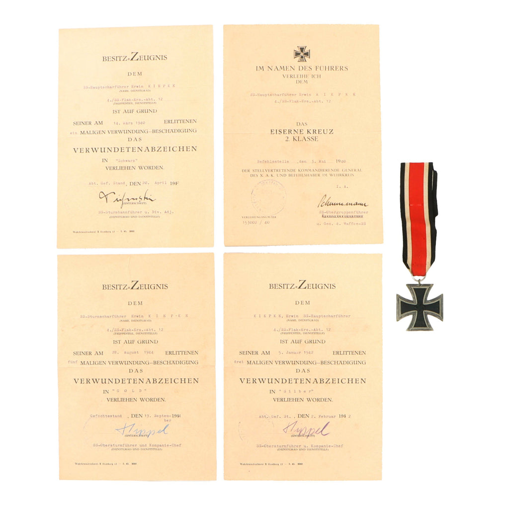 Original German WWII Award Document Grouping Named to Waffen SS-Sturmscharführer Erwin Kiepke with EKII Award - SS Flak Ersatz Regiment Original Items