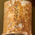 Original U.S. WWII Outstanding Inert Battle of the Bulge Relic Display Board with Bayonets, Cartridges, BAR Magazine, Artillery Fuzes, and More - 23 ⅞ x 23 ⅞”