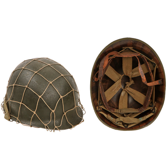 Original U.S. WWII Schlueter Rear-Seam Swivel-Bale M1 Helmet with Firestone Liner and Period Helmet Net Original Items