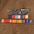 Original U.S. WWII CBI AAF Technical Sergeant Uniform Group with Indian-Made Wings, Visor Cap, and Binder of Research with Photo of Soldier in this Uniform - Eugene E. Kowalski