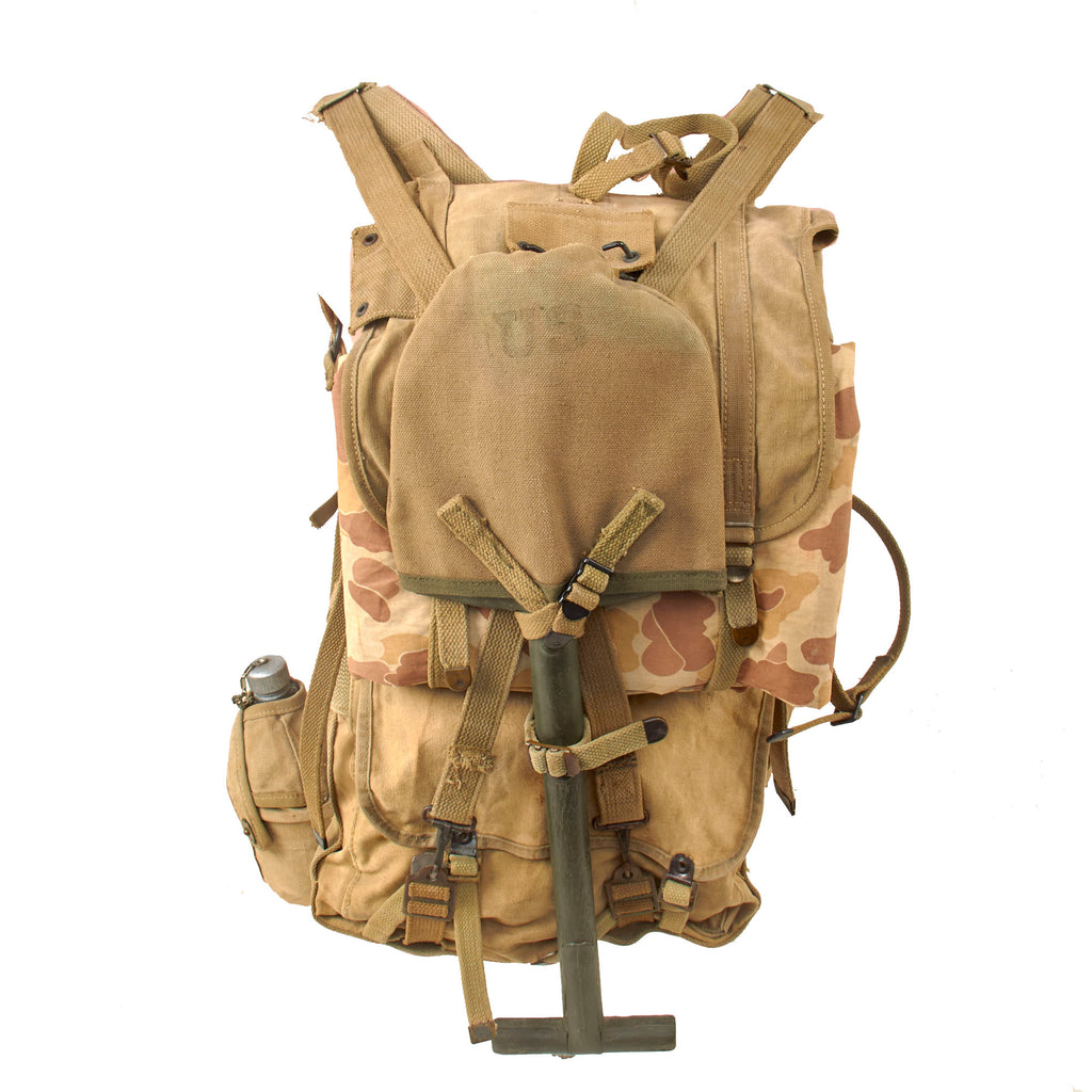 Original U.S. WWII USMC Marine Equipment Lot: P-41 Pack Set, Poncho, T-Handle Shovel, Grenade Pouch, Carbine Belt Rig, & Rabbit Ear Canteen Set