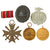 Original German WWII Award and Tinnie Grouping with KvKII with Swords, War Merit Medal, and More - 6 Items Original Items
