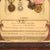Original French WWI Named and Framed “En Memoir de la Grande Guerre” 1914-1918 Service Certificate With (4) Medals Attached Original Items
