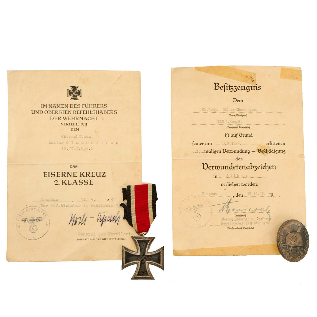 Original German WWII Set of 2 Awards with Documents Named to Oberschützen Walter Clausnitzer of Infantry Regiment 8 Original Items