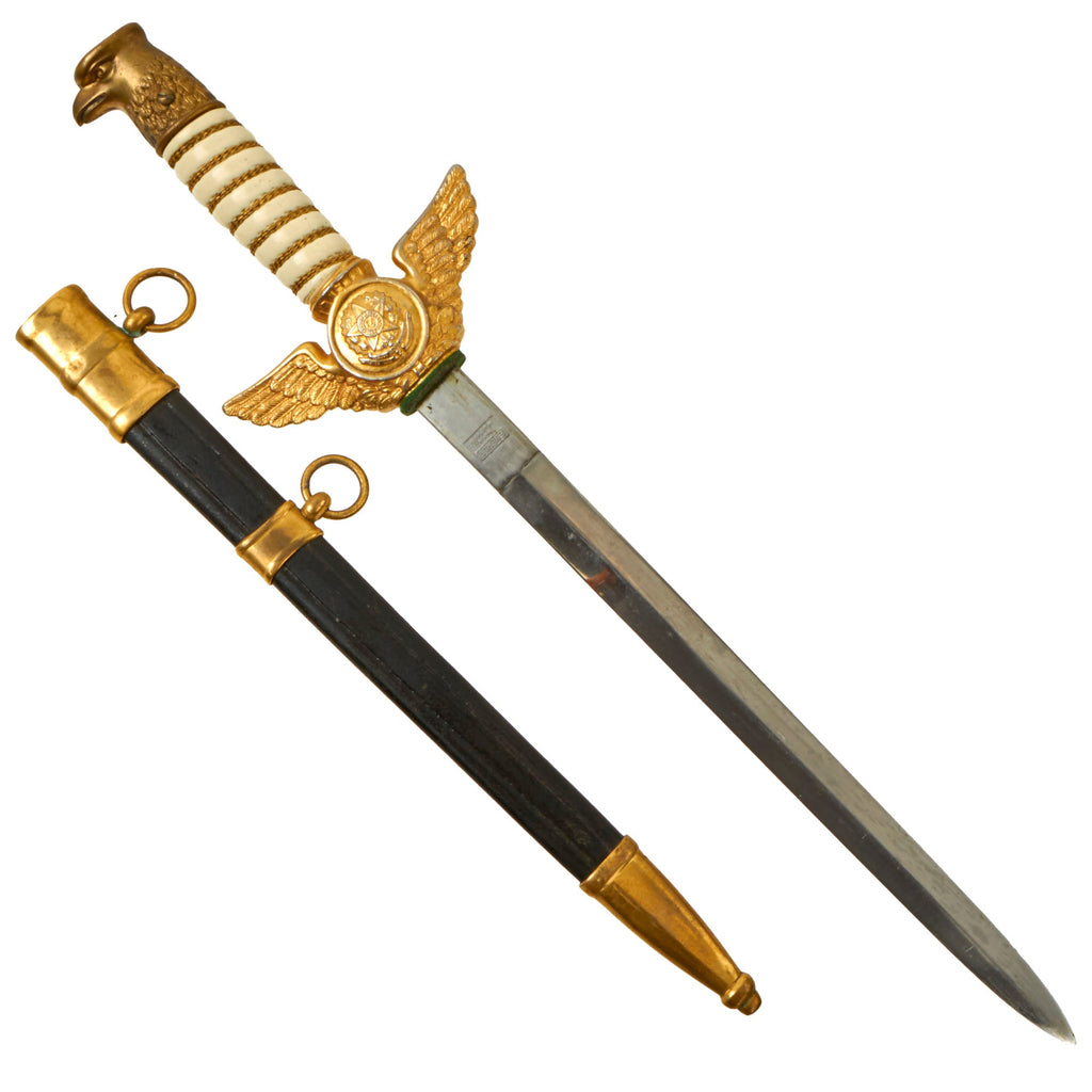 Original Brazilian Cold War Era Brazilian Air Force (Força Aérea Brasileira, FAB) Eagle Head Dress Dagger WIth Fluted Leather and Brass Scabbard by German Firm Eberle Original Items