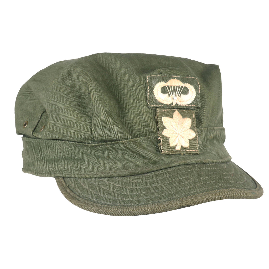Original U.S. Vietnam War HBT Cap with Theater Made Paratrooper Lieutenant Colonel Insignia - Size 7 Original Items