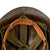 Original U.S. Late Vietnam War Era Military Police M1 Helmet with 1974 Dated Camouflage Cover, Liner and Leather ‘MP’ Brassard Original Items