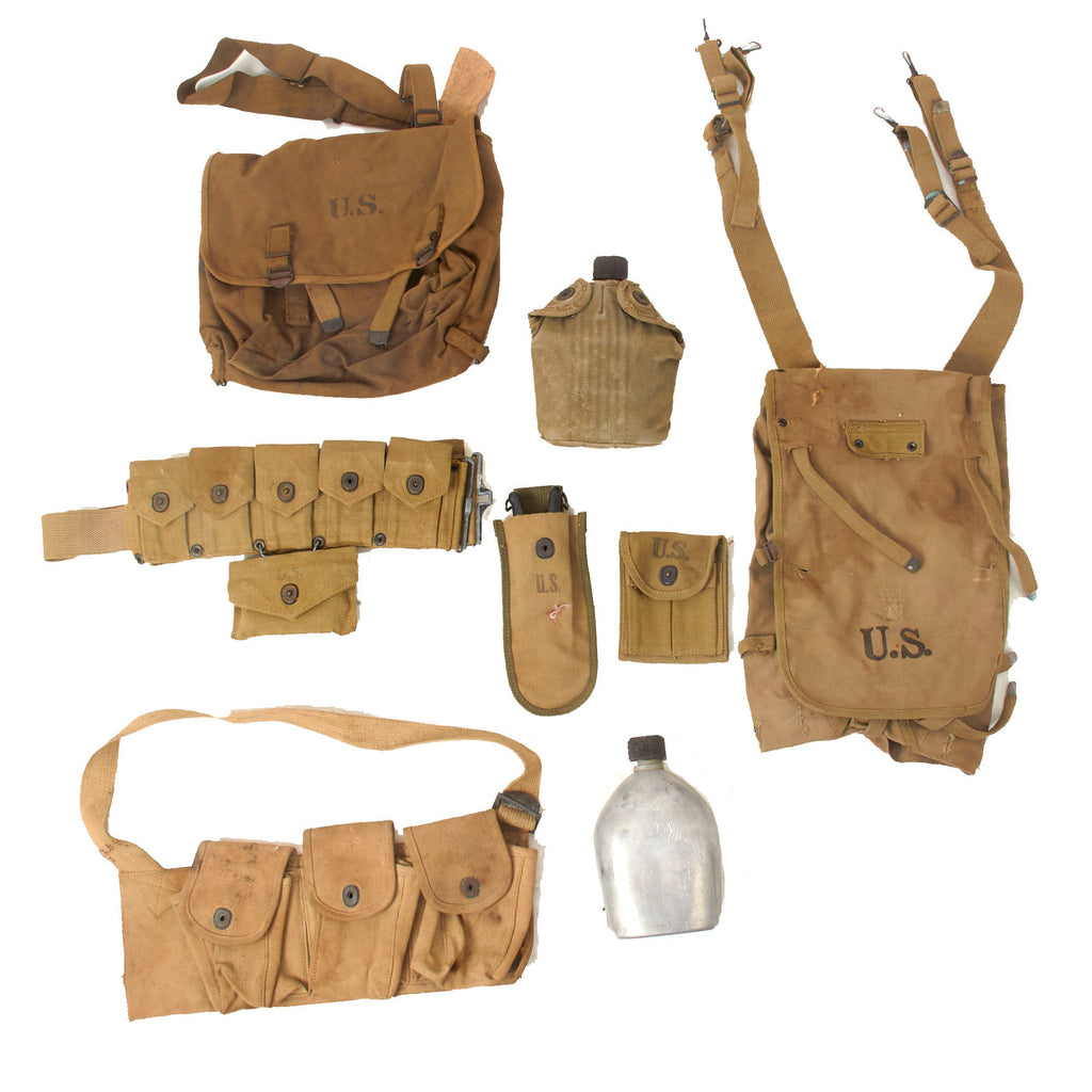Original U.S. WWII - WWI Field Gear Lot - Named AAF 381st Bomb Group Officer’s Musette Bag with Customs Declaration Tag Attached and M1910 Gear - 8 Items Total Original Itemsa