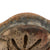 Original U.S. Operation Iraqi Freedom Iraqi-Used Wz50 Steel Helmet with Tattered Tan Helmet Cover Fragments