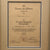 Original German WWII Framed West Wall Medal Group with 1940 Award Document to Erich Kurz and Two Medals - 11" x 21"