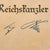 Original German WWII Framed 40-Year Gold Faithful Service Decoration with Named Award Document to Oberwachtmeister Friedrich Wilhelm Riesterer - Dated 1939 - 18” x 18”
