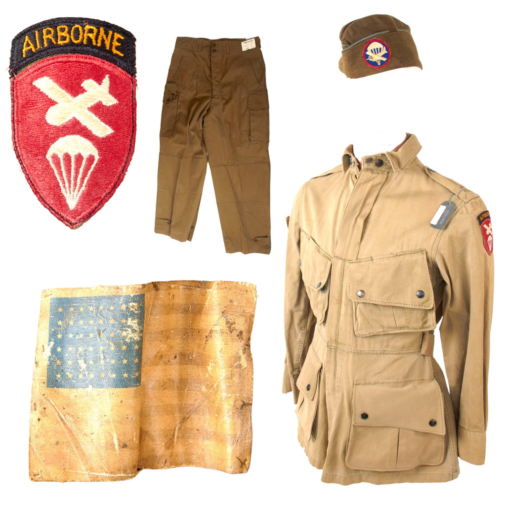 Original U.S. WWII Airborne Troop Carrier M1942 Paratrooper M42 Jump Jacket without Reinforcements with Flag Patch & Replaced Zipper and French-Made Pants with Garrison Cap Original Items