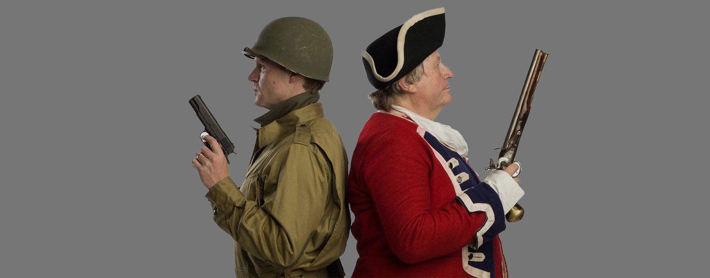 Christian and Alex Cranmer posing in vintage military uniforms with period-appropriate firearms