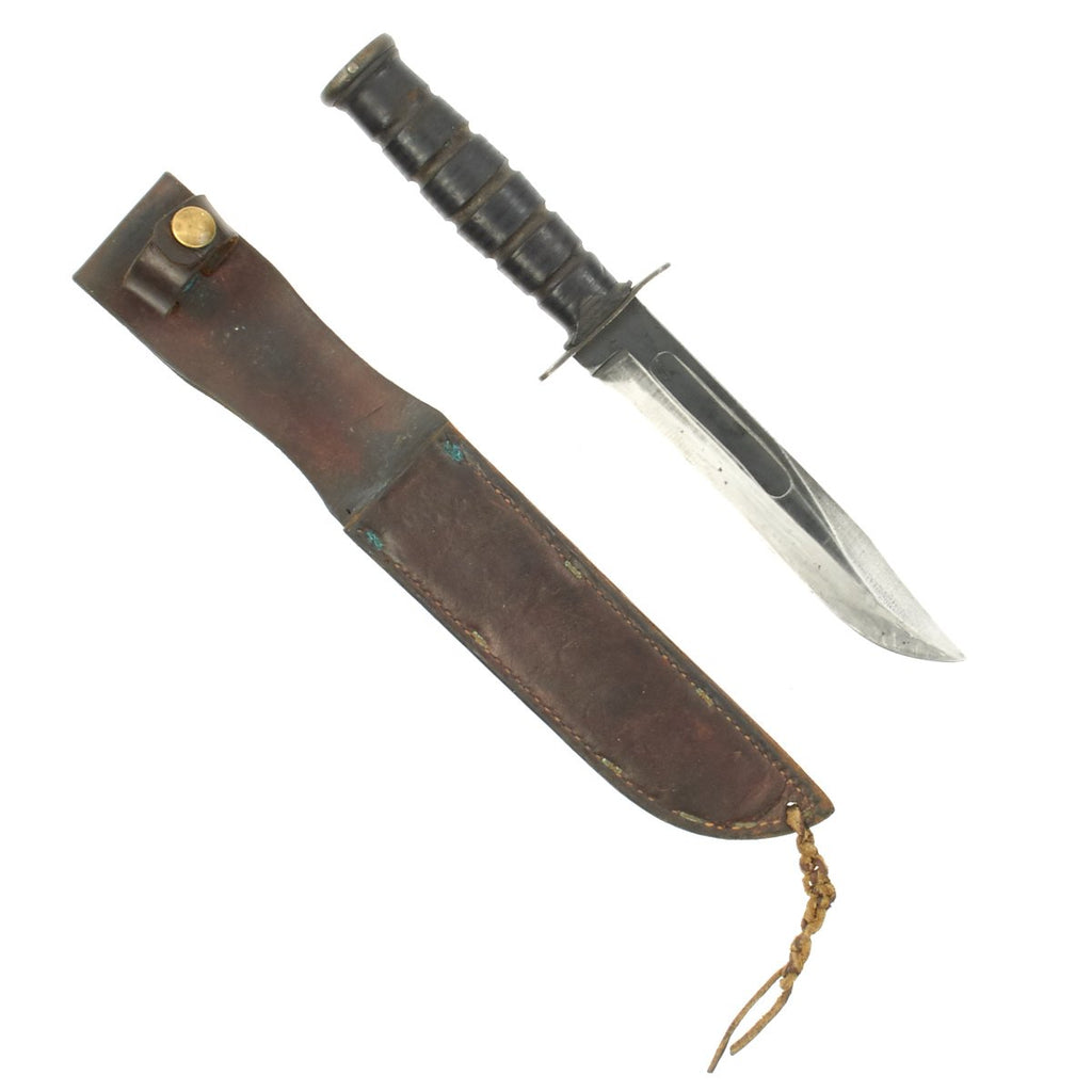 Original U.S. WWII USMC Mark 2 KA-BAR Fighting Knife by CAMILLUS with Leather Scabbard Original Items