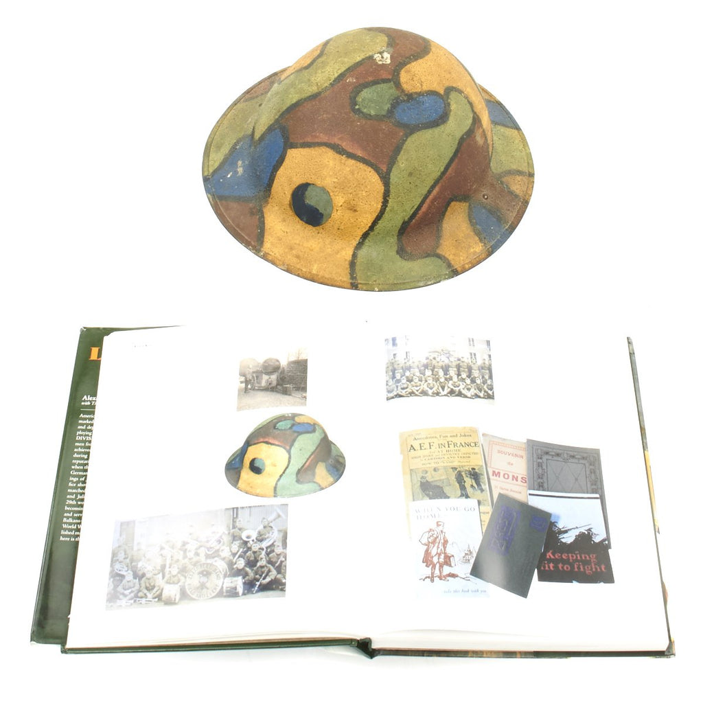 Original U.S. WWI 29th Infantry Division M1917 Camouflage Painted Helmet with Lets Go! Book Original Items