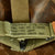 Original U.S. Vietnam M1 Helmet with USMC Camouflage Cover and Firestone Liner Original Items