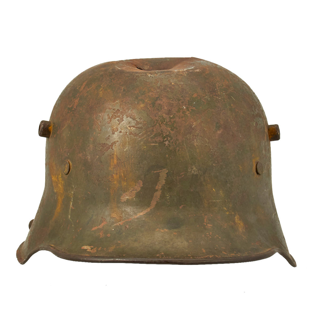 Original German WWI Battle Damaged M16 Stahlhelm Helmet with Camouflage Paint and Liner - marked Si66 Original Items