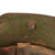 Original German WWI Battle Damaged M16 Stahlhelm Helmet with Camouflage Paint and Liner - marked Si66 Original Items