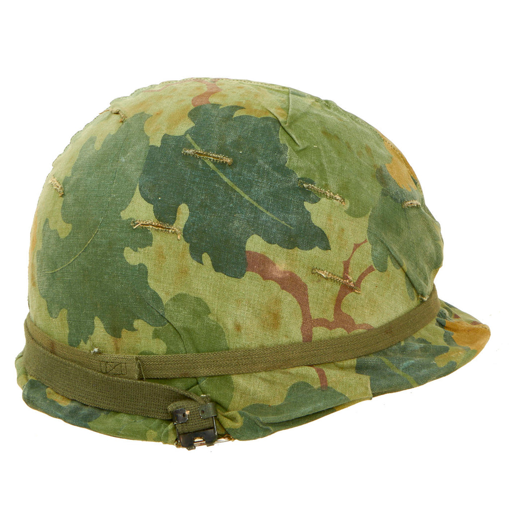 Original U.S. WWII - Vietnam War Era McCord M1 Helmet With Mitchell Pattern Camouflage Helmet Cover 133rd Military Police Company Helmet Liner - Complete Original Items