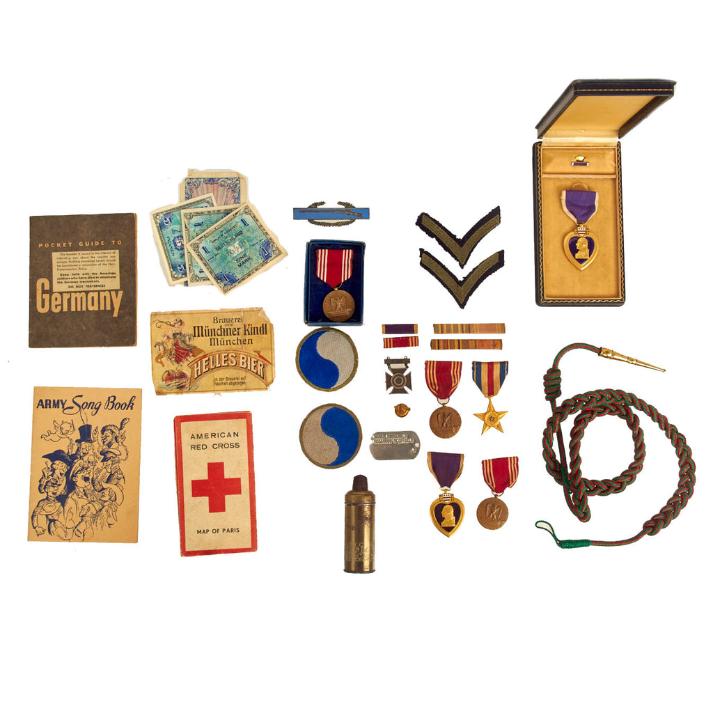 Original U.S. WWII 29th Infantry Division Grouping Featuring X2 Purple Hearts and Silver Star - 28 Items Original Items