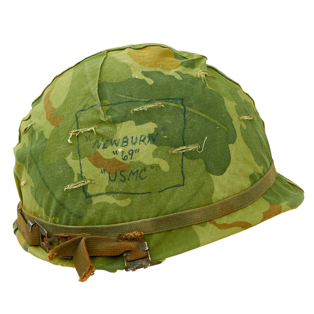 Original U.S. Korean War Era - Early Vietnam War McCord M1 Helmet With Mitchell Pattern Camouflage Helmet Cover With Period Graffiti, Helmet Band, and Korean War Westinghouse / CAPAC Liner - Named Original Items