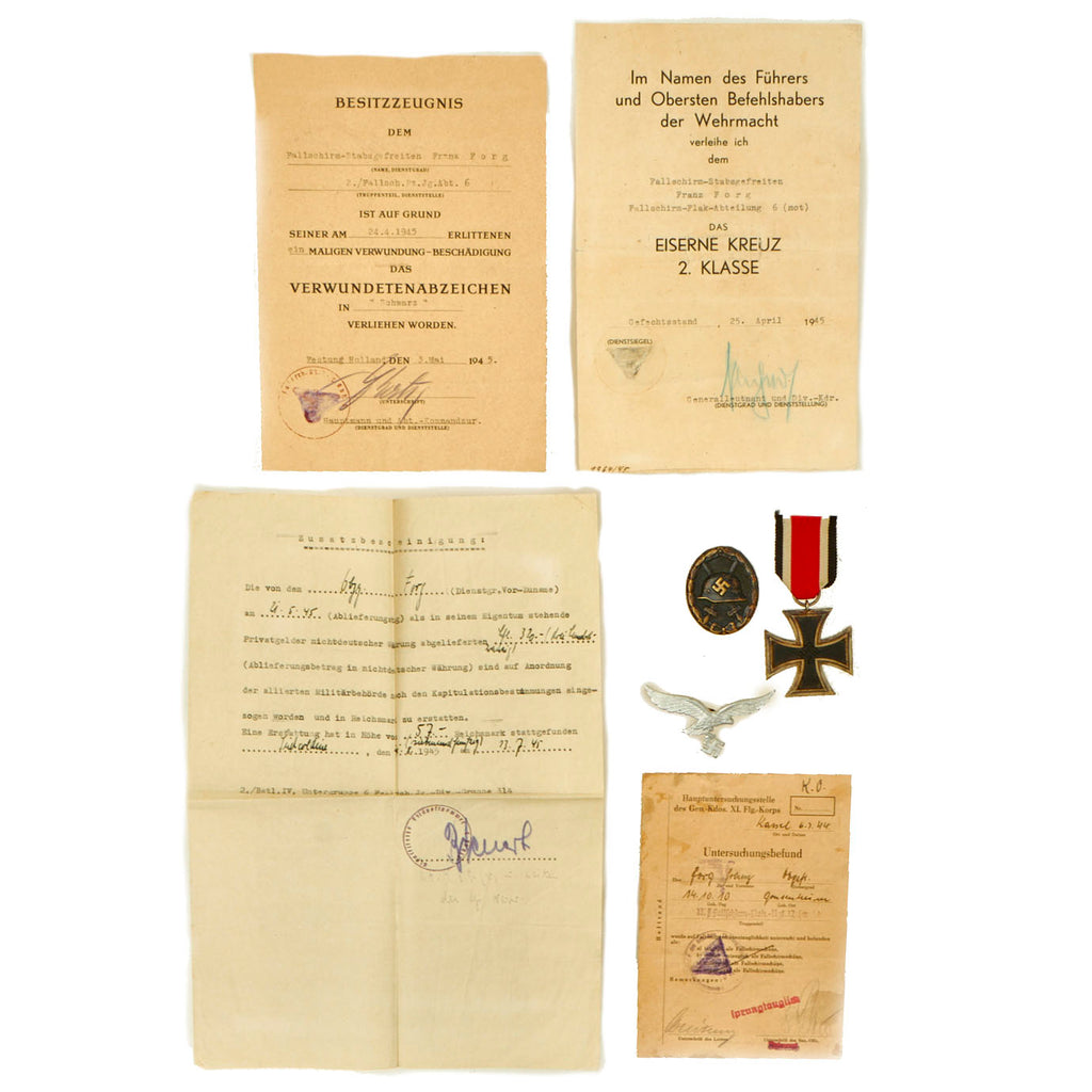 DRAFT 1 Original German WWII Set of 4 Awards with Documents named to Lt. Hermann Ebenbeck of Light Flak Detachment 74 Original Items