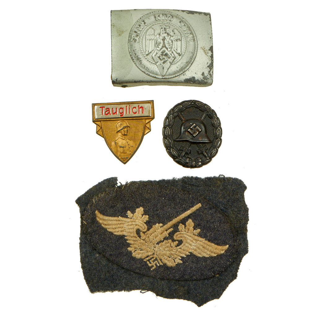 Original German WWII Unissued HJ Belt Buckle Lot With 1st Pattern Black Wound Badge, Tinnie And Flak Insignia - 4 Items Original Items