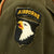 Original U.S. WWII 101st Airborne Class A Uniform Coat with Order of the Orange Holland Cord Original Items