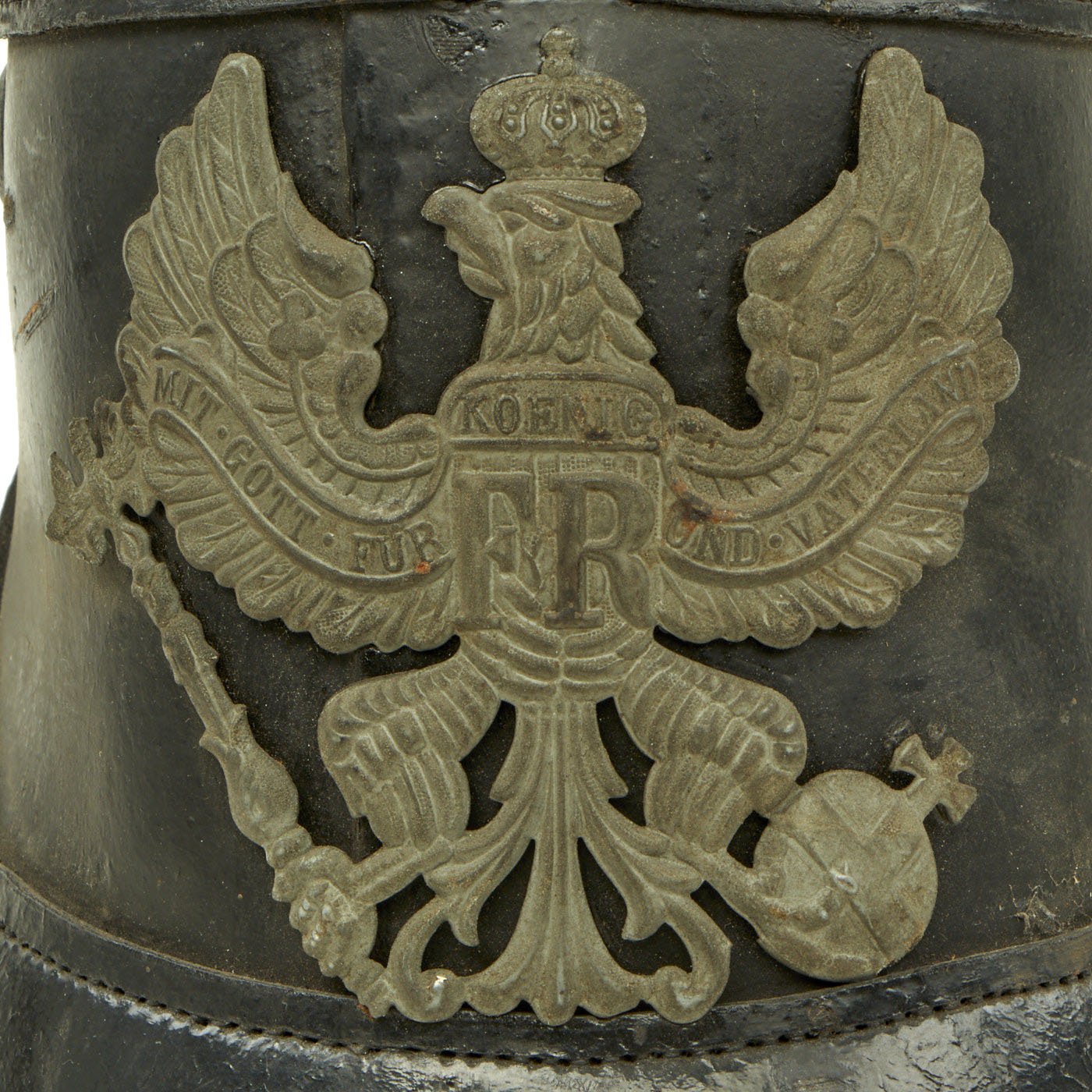 A wartime grey trim enlisted men's shako for Prussian units, Black leather  body, front and back visors. EM field-grey Prussian eagle front plate  attached by two loops with leather inserts, black and