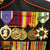 Original U.S. Marine Corps Vietnam War Identified Sergeant Wool Gabardine Coat with Medals and Honorable Discharge and Portrait Original Items