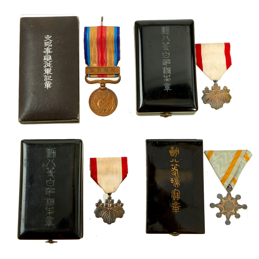 Original Imperial Japanese Cased Military Medals of Honor Lot Featuring Order of the Rising Sun, Order of the Sacred Treasure and China Incident War Medal - 4 Items Original Items