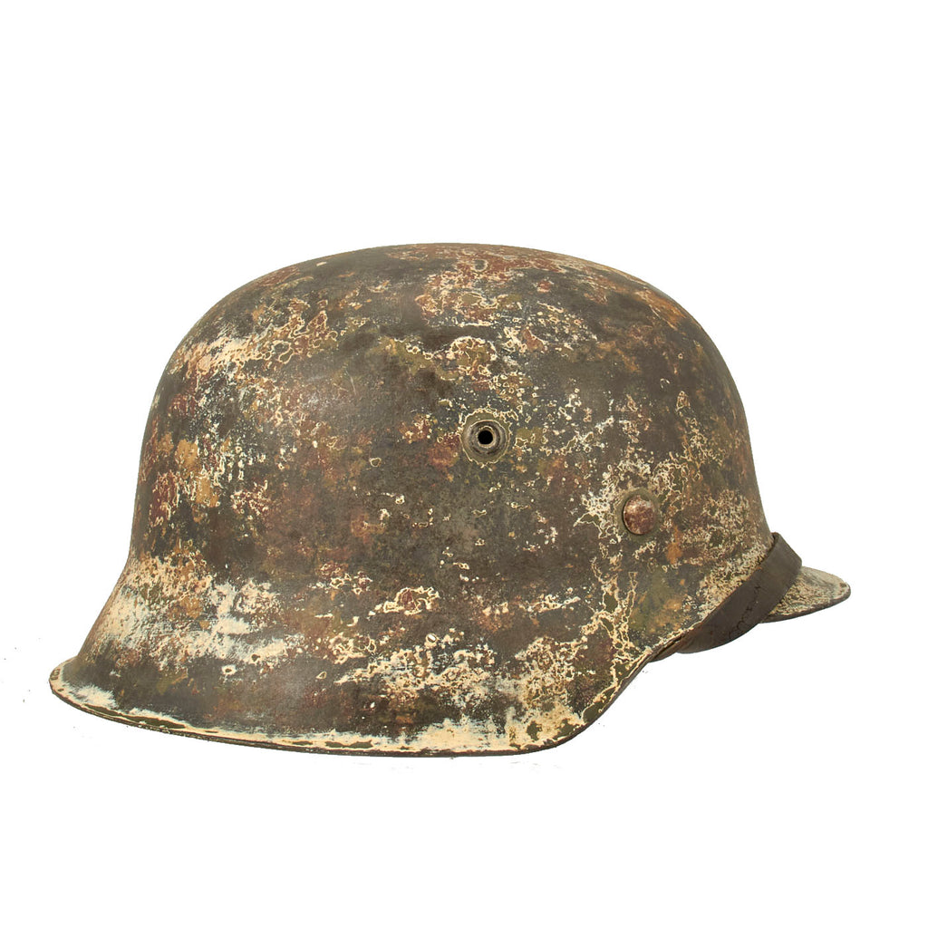 Original German WWII M42 Helmet with Textured Summer Camouflage Paint and Remnants of Winter Whitewash- Complete with Liner and Chinstrap Original Items