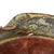 Original German WWII M42 Helmet with Textured Summer Camouflage Paint and Remnants of Winter Whitewash- Complete with Liner and Chinstrap Original Items