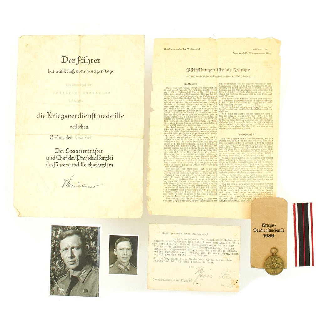 Original German WWII Named 1939 War Merit Medal & Award Document grouping with Pictures Original Items