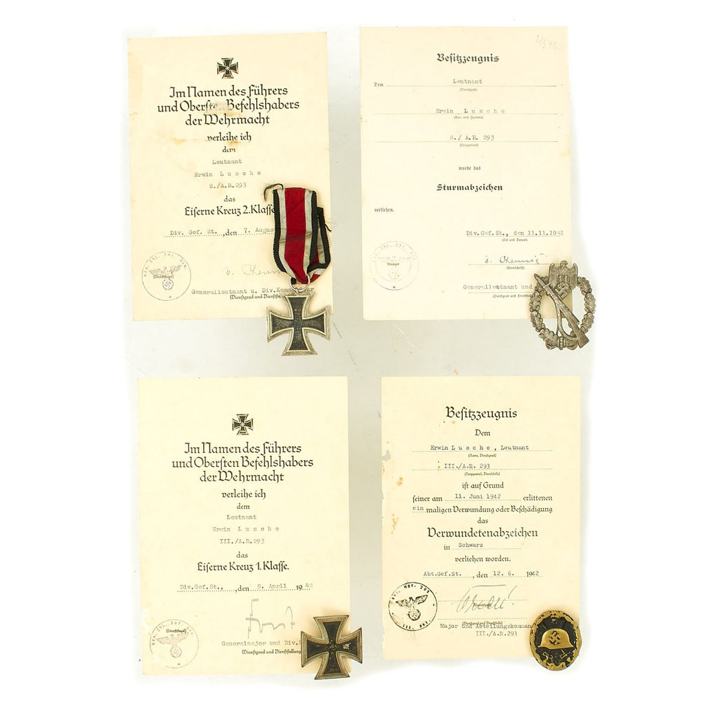 Original German WWII Set of 4 Awards with Documents named to Lt. Erwin Lusche of 293rd Artillery Regt. Original Items